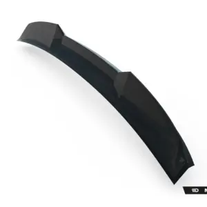 Close-up of a glossy black diagonal bar with faceted ends on a white background; Maxton Design branding appears in the lower corner, right-hand side.