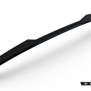 Close-up of a glossy black automotive aero part, diagonally oriented on a white background, with Maxton Design branding visible in the bottom corner.