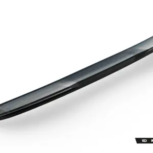 Close-up of a sleek windshield wiper blade angled diagonally on a white background, with Maxton Design branding in the corner.