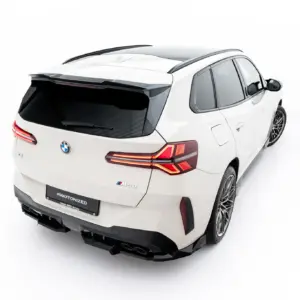 Rear three-quarter view of a white BMW SUV, showcasing its taillights, rear spoiler, and large alloy wheels.