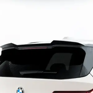 Rear view of a white BMW SUV showing the tailgate, spoiler, and distinctive taillights with the BMW badge visible on the hatch.