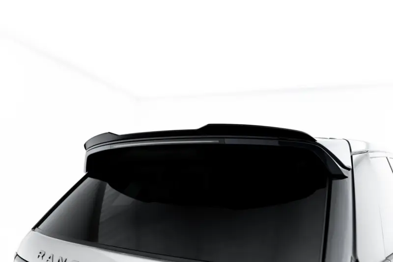 Top-down view of a white SUV showing the rear window and partial RAM branding on the tailgate.
