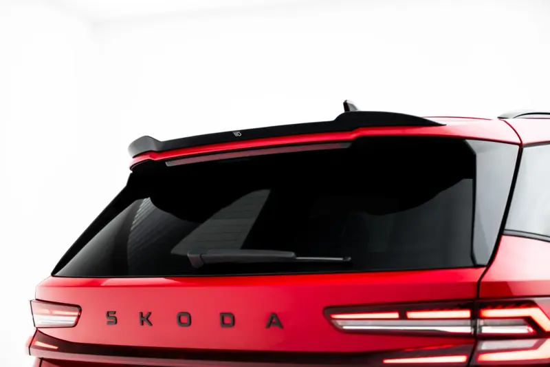 pol_po_Spoiler-Cap-Skoda-Kodiaq-RS-Mk2-23905_2webp - OPSHOLDERS Red Skoda car rear with brand lettering and red taillights visible