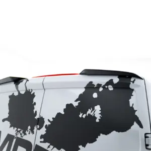 White van with a large black world map decal along its side panel, partial rear door visible