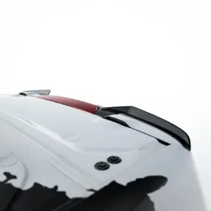 Close-up of a white car hood with a red accent stripe and black trim at the top edge of the image.