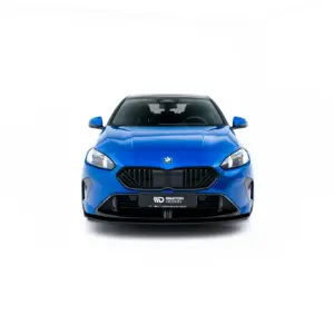 Front view of a blue BMW SUV with black grille and logo, shown against a white background, dealership plate reading 'MaxTon Design'