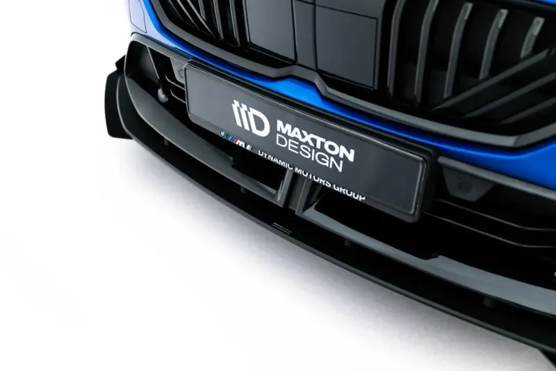 pol_po_Street-Pro-Front-Splitter-Flaps-BMW-2-M-Pack-M235i-Gran-Coupe-F74-23837_1webp - OPSHOLDERS Close-up of the car’s front bumper with blue accents and a Maxton Design plate holder.