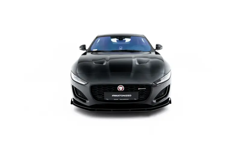 pol_po_Street-Pro-Front-Splitter-Flaps-Jaguar-F-Type-X152-Facelift-2-23974_5webp - OPSHOLDERS Front view of a glossy black Jaguar car with prominent grille and blue-tinted windshield, displaying the hashtag #MAXTONIZED on the license plate area