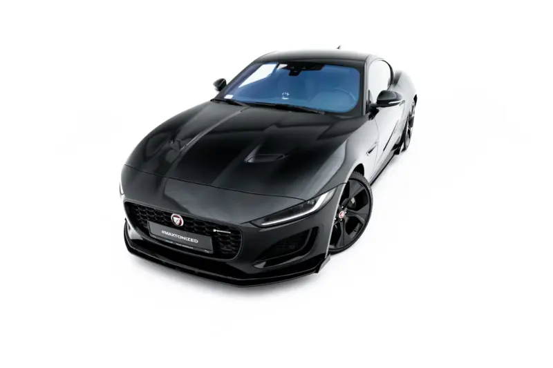 pol_po_Street-Pro-Front-Splitter-Flaps-Jaguar-F-Type-X152-Facelift-2-23974_7webp - OPSHOLDERS Front three-quarter view of a glossy black Jaguar sports car against a white background.