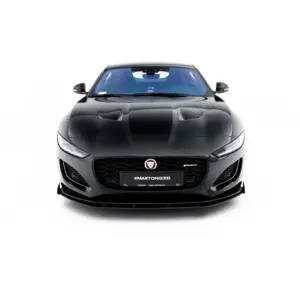 Front view of a black Jaguar car with a #MAXTONIZED plate, hood vents and sleek grille visible on a white background.