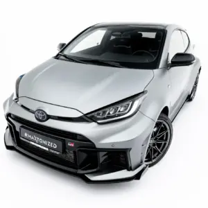 Front-left angled view of a silver car showing its sporty grille, headlights, and alloy wheels.