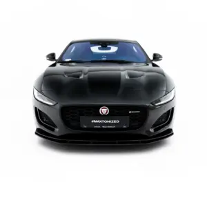 Front view of a black Jaguar sports car against a white background, with #MAXTONIZED on the license plate area.