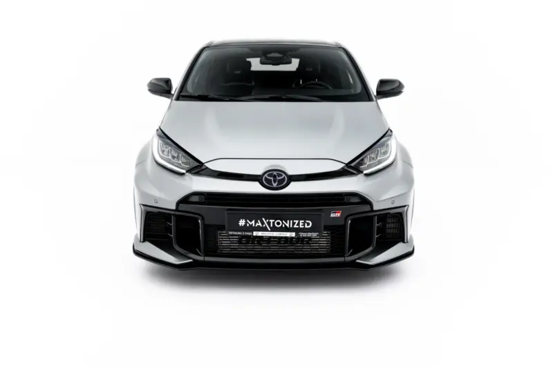 Front view of a white Toyota SUV with a black grille and '#MAXTONIZED' plate in the center of the bumper