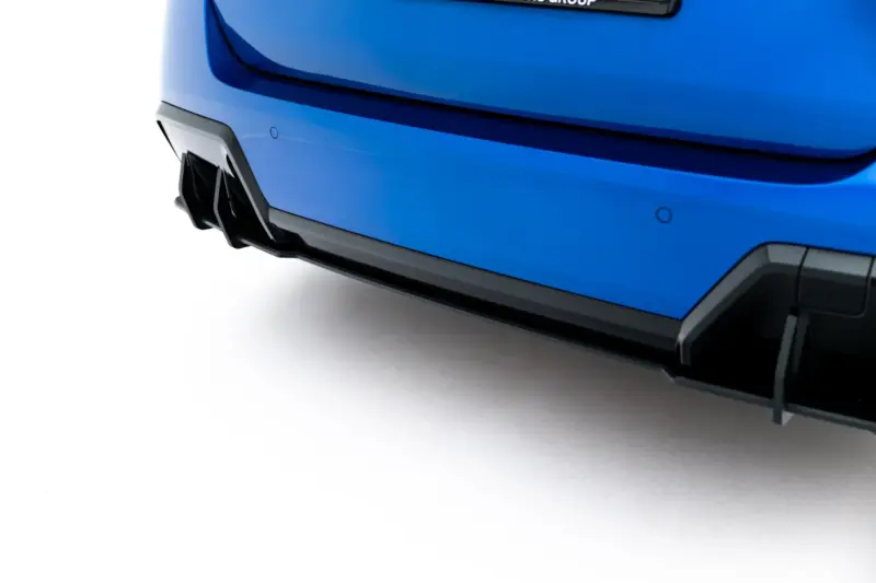 pol_po_Street-Pro-Rear-Diffuser-Flaps-BMW-2-M-Pack-Gran-Coupe-F74-23851_3webp - OPSHOLDERS Close-up of the blue car's rear bumper and exhaust diffuser with clean white background.