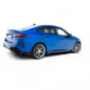 pol_po_Street-Pro-Side-Skirts-Diffusers-Flaps-BMW-2-M-Pack-M235i-Gran-Coupe-F74-23842_7webp - OPSHOLDERS Blue BMW sports sedan shown from rear three-quarter view against a white studio background.
