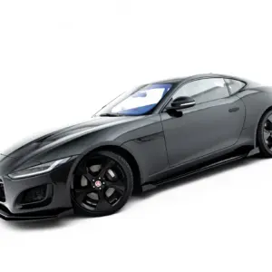 Gray Jaguar sports car shown from a front-left angled view, with black alloy wheels on a white background.