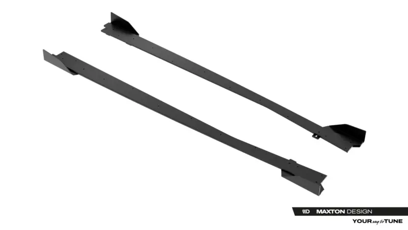 Two long dark gray automotive aero panels with endplates, laid diagonally on a white background (likely side skirts or diffusers)