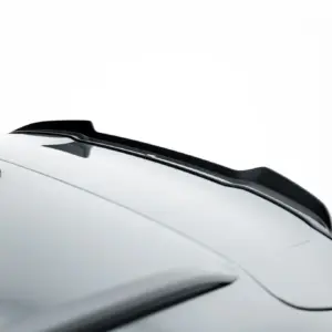 Close-up of a white car roof with a black spoiler and sleek lines omitted in background.