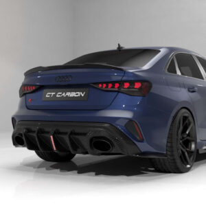 Blue Audi sports sedan rear view with a carbon fiber diffuser, quad exhausts, and red taillights in a studio setting, badge reads CT CARBON.