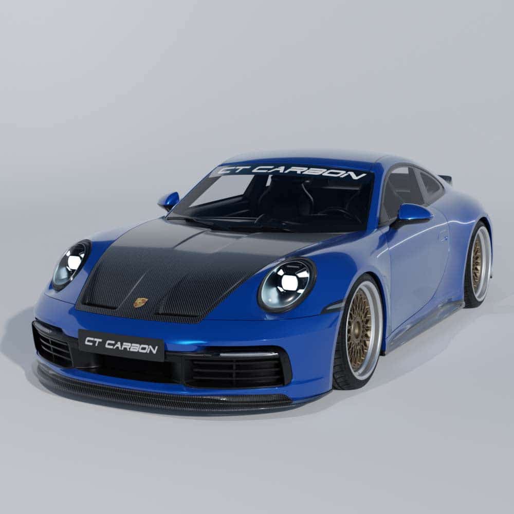 03_2a7b5aeb-c73c-4911-ac72-4858836efe7bjpg - OPSHOLDERS Blue Porsche sports car with carbon fiber hood, angled three-quarter front view showing gold wheels and aero details