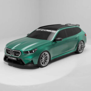 Green sports wagon car in a white studio, with a black roof and large silver wheels, showing a CT CARBON branding on the windshield.