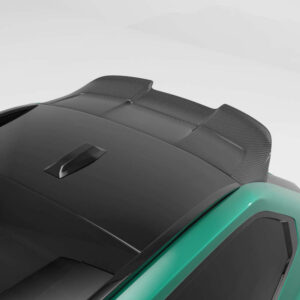 Green sports car roof with a carbon fiber rear spoiler, viewed from above-right side.