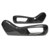 1_0a2e17a4-438c-4bc1-9961-0dfdee8d9dd0jpg - OPSHOLDERS Two glossy carbon fiber automotive interior trim pieces with rectangular openings.