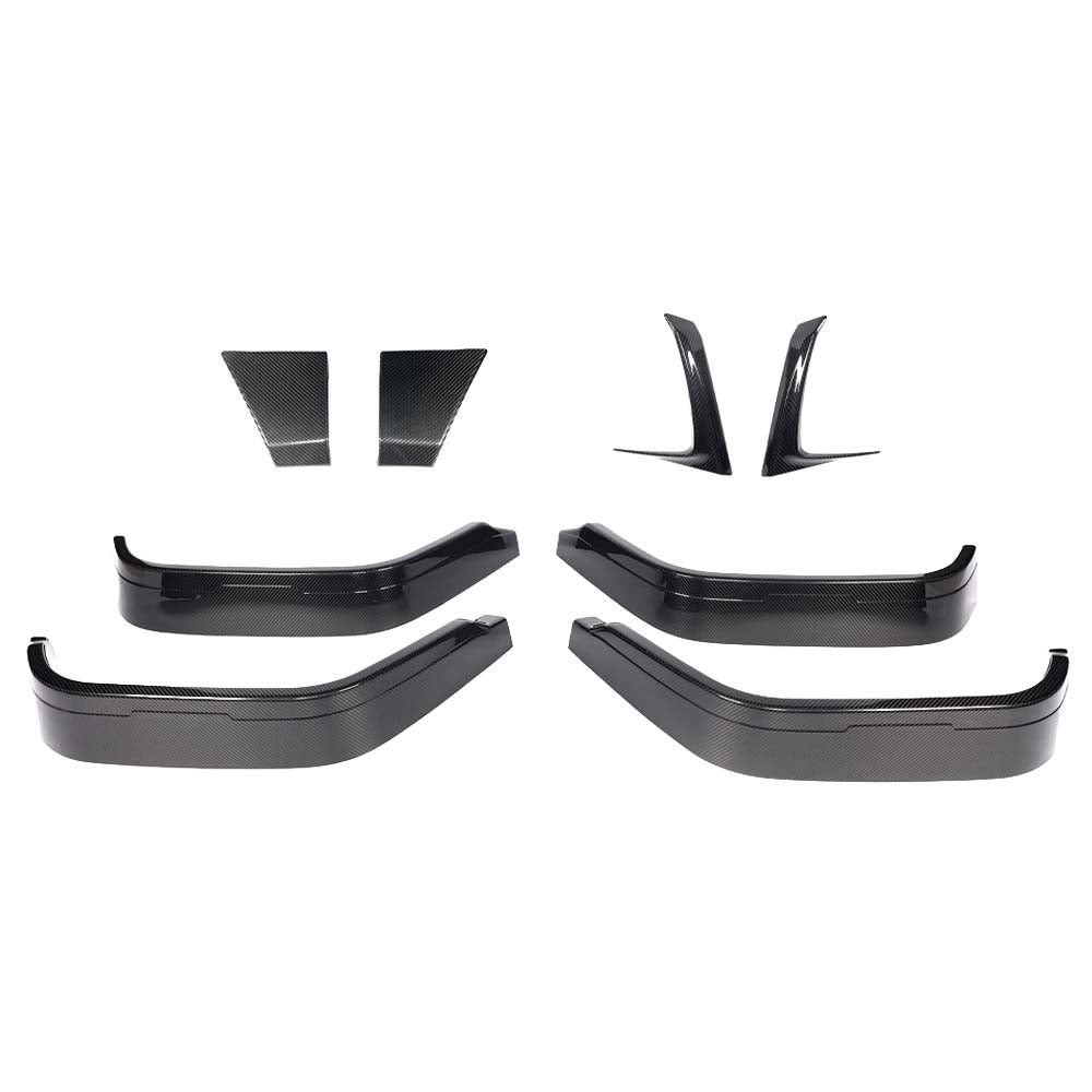 1_1ae91e52-0b61-4e64-8b4b-c31fca5835d4jpg - OPSHOLDERS Carbon fiber aero kit components for a car: front splitter pieces, side skirts, and rear diffusers laid out on a white background