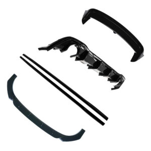 Unassembled black car body kit parts arranged in a scattered layout: curved rear lip, center diffuser with multiple fins, and two long side pieces