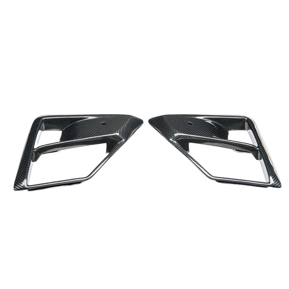 1_af8322d4-35c4-40df-937c-016ebdc15f27jpg - OPSHOLDERS Pair of carbon-fiber car trim accents with angular rectangular openings, likely exterior decorative pieces on a vehicle relief.