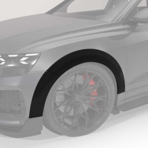 Close-up of a sports car’s front left section showing a carbon fiber fender flare and a wheel with a red brake caliper visible through the alloy rim