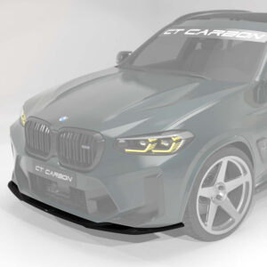 3/4 front view of a gray BMW SUV with a carbon fiber front splitter and CT Carbon branding on the windshield area.