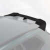 26_64aa68ae-2849-46ff-8c43-e3011a71bd4ejpg - OPSHOLDERS White car roof with a black carbon-fiber rear spoiler mounted on the trunk lid edge.
