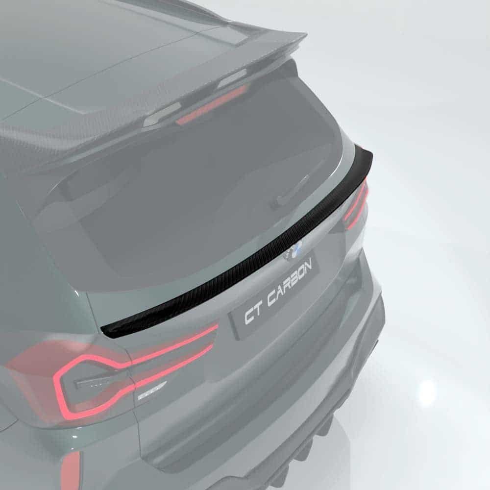 27_a7613e3f-e71d-40d3-bc22-fe4b234aad49jpg - OPSHOLDERS Rear view of a gray SUV with a carbon spoiler and red tail lights, badge reading 'CT CARBON'