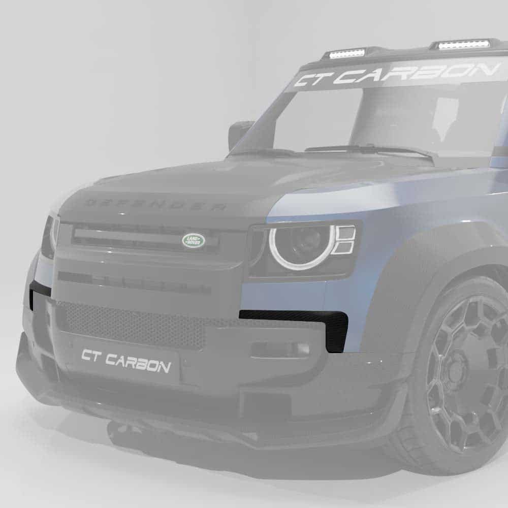 31_9c6010ea-d153-4efe-8fb2-b265ba00e5dejpg - OPSHOLDERS Front 3/4 view of a blue-gray off-road vehicle with GT CARBON branding on the bumper and high-performance rims (informative).