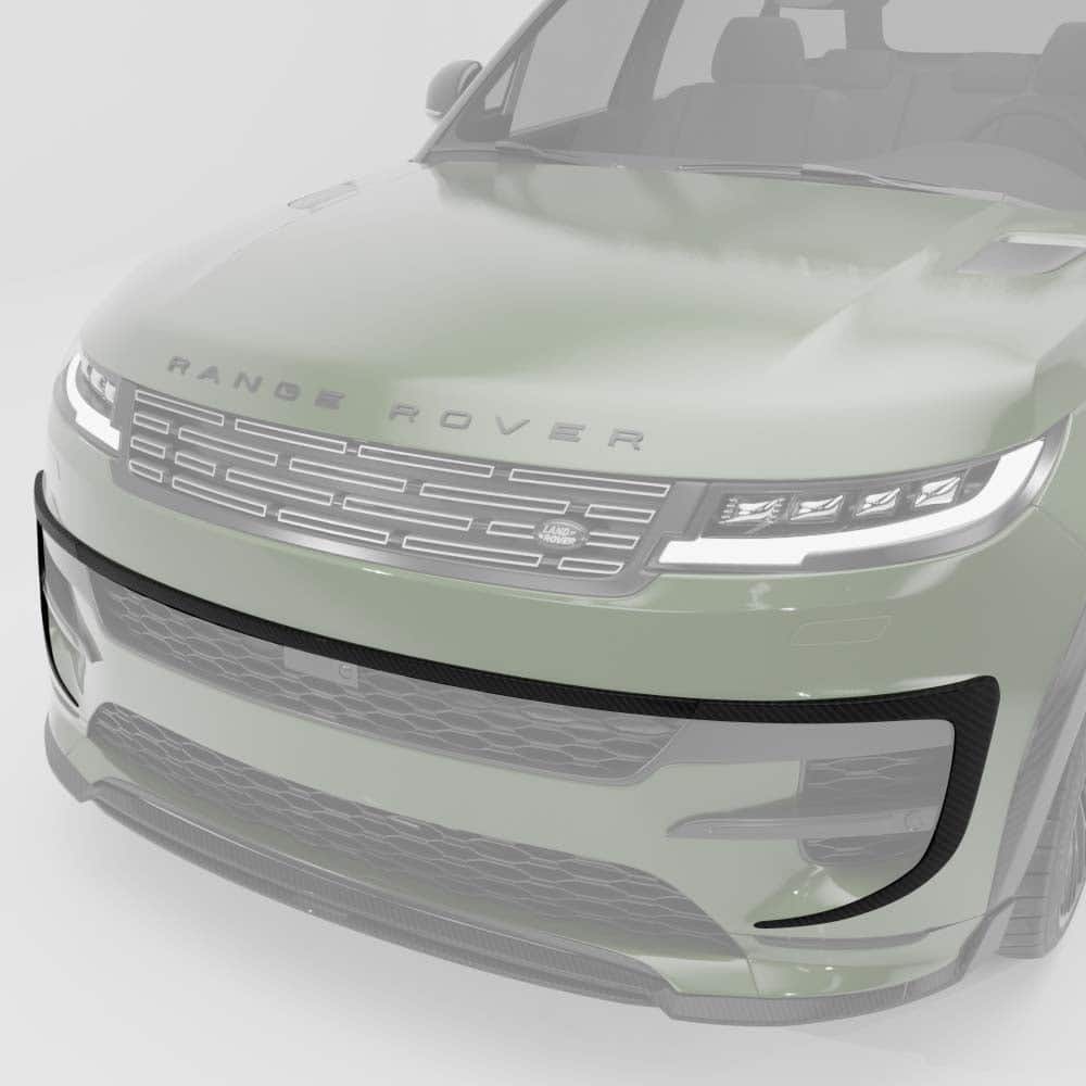 38_8827a095-6c01-4fa7-839a-edc6a2145fd6jpg - OPSHOLDERS Front view of a pale green Range Rover SUV with a bold chrome grille and LED headlights.