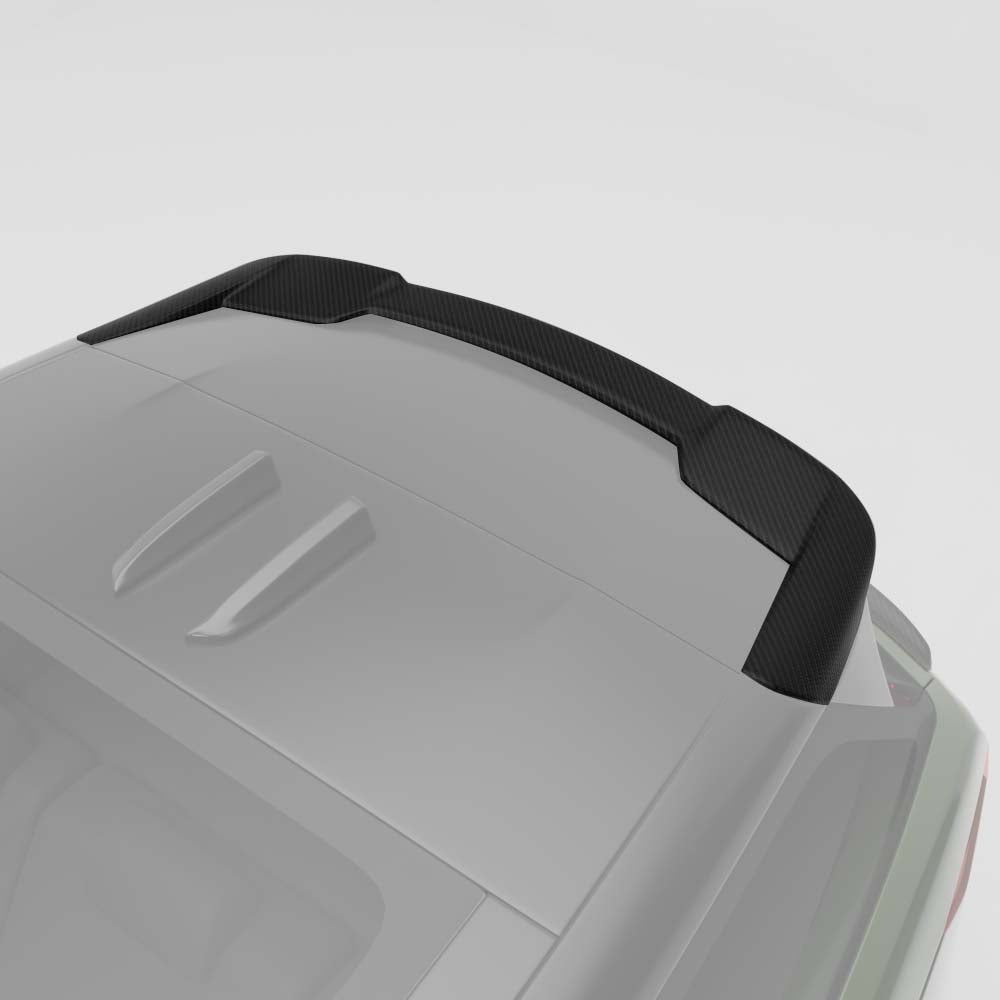 42jpg - OPSHOLDERS White car roof featuring a black carbon fiber rear aero spoiler running along the top with a textured finish.