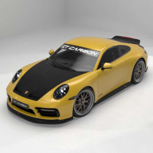 Yellow Porsche 911-style sports car with a black hood and carbon accents, shown in a studio setting with a GT Carbon banner on the windshieldart.