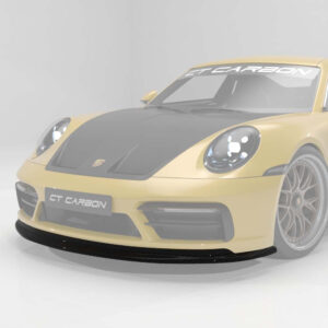 Yellow Porsche 911 with carbon fiber hood and large front splitter in a studio; GT CARBON branding on windshield banner and license plate area