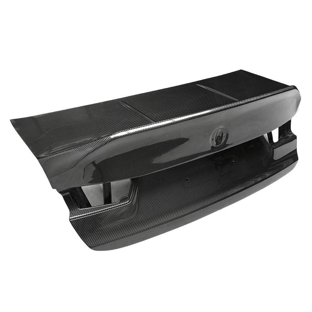 4_0acf1308-9763-48b2-a9e7-a9c94c944948jpg - OPSHOLDERS Carbon fiber rear spoiler for a car with mounting brackets, shown from a side angle.