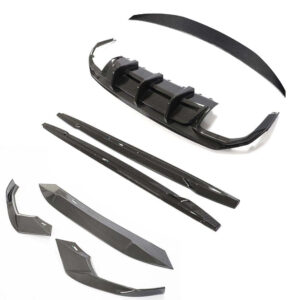 Set of black carbon fiber car body kit parts (front lip, side skirts, diffusers) laid out on a white background.