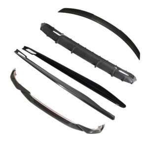 Set of five windshield wiper blades in different sizes and designs laid out diagonally for a car windshield replacement kit