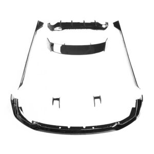 Assorted black car body panels laid out on a white background, including a front bumper cover, side rails, and rear spoiler pieces.