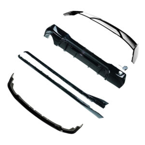 Disassembled car bumper components laid out, showing bumper cover, reinforcement bar, side braces, and mounting pieces