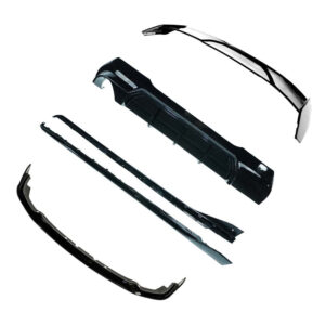 Disassembled car bumper parts spread apart on a white background (frontal bumper, side skirts, and trim pieces) for a replacement kit.