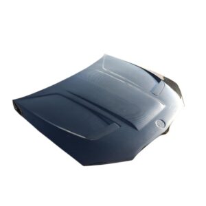 Blue car hood with sculpted curves and a vent, photographed from above against a white background, showing glossy metallic finish.