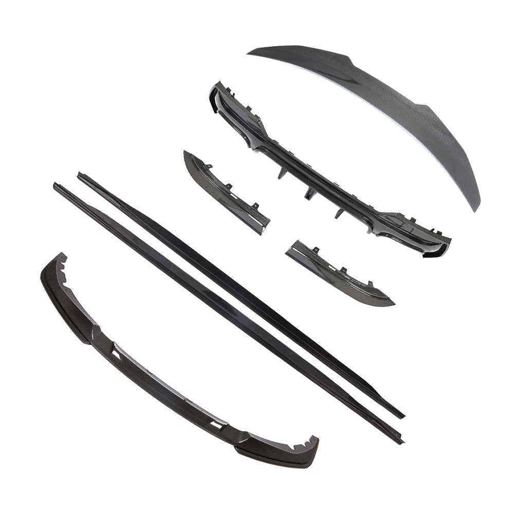 BMW-M44-SERIES-G82G22-PRE-PREG-CARBON-FIBRE-SPOILER-DA-STYLE-2_181c250f-25ca-4124-8b2e-ed4d3020e678jpg - OPSHOLDERS Set of carbon-fiber automotive body parts and trim pieces laid out on a white background