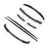 BMW-M44-SERIES-G82G22-PRE-PREG-CARBON-FIBRE-SPOILER-DA-STYLE-2_72d7d133-8e70-4bbf-a76c-542344449284jpg - OPSHOLDERS Scattered black car bumper components and trim pieces, including a front lip and side pieces, laid out separately.