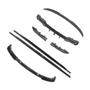 Replacement windshield wiper blades and components laid out in pieces for a car.