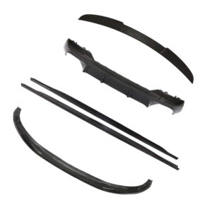 Carbon fiber car body kit parts laid out: curved spoiler lip, long side trim pieces, and supporting mounting strips for aero body kit